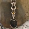 Metallic Scheme Graduated Captured Ball Pendant